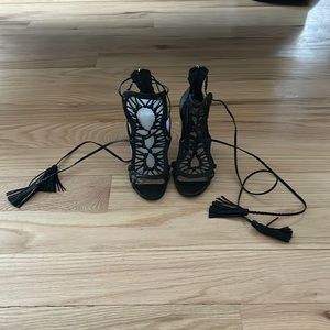 Black schutz front detail wrap around leather heels